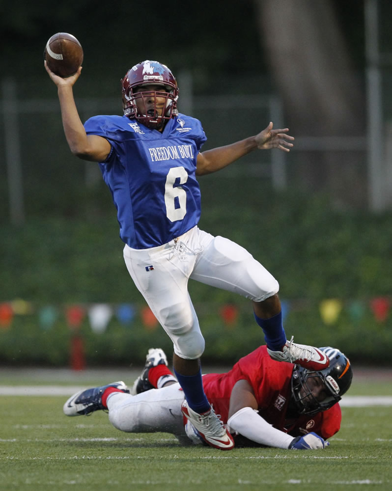 East quarterback Jacob Austin of Prairie passes during Freedom Bowl at Kiggins Bowl.