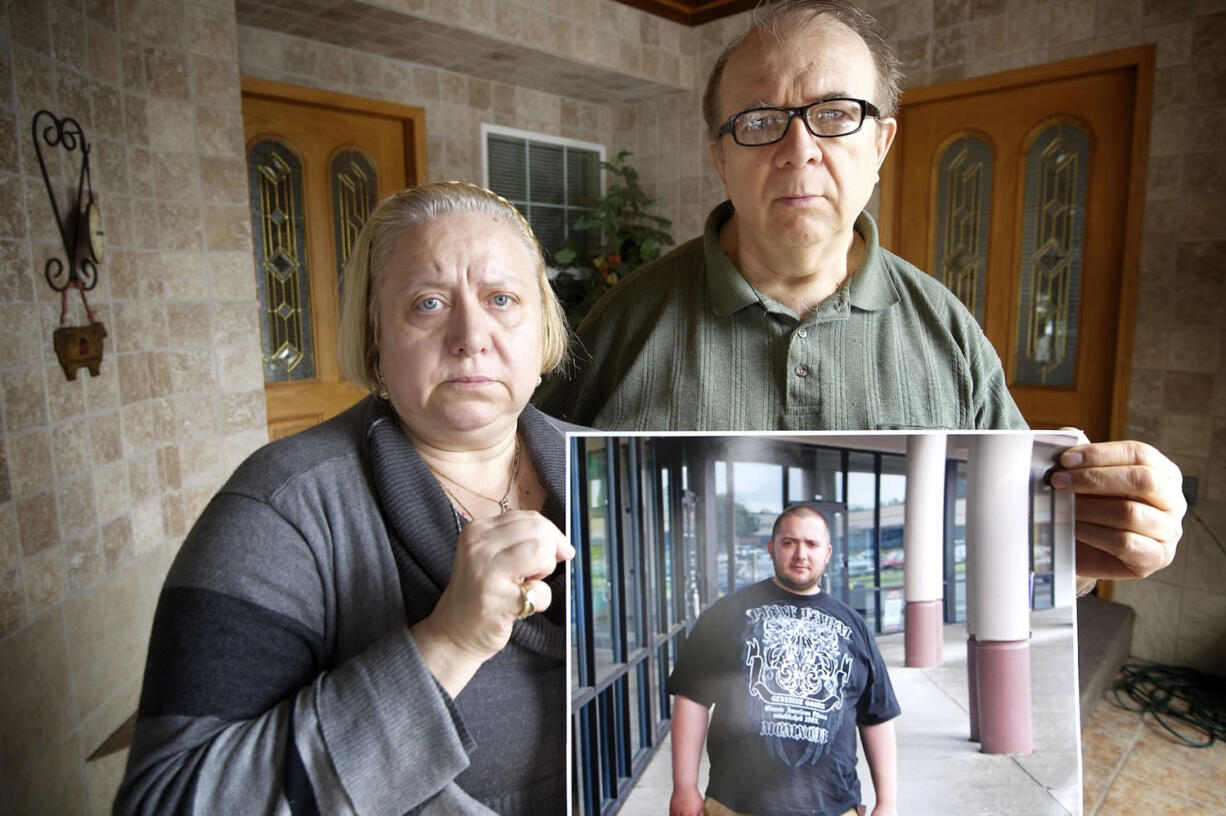 Afrodita and Cristian Asanachescu talk about their son, Marius Asanachescu, at their home March 22 in Vancouver. Marius died while in custody in the Clark County Jail on Feb.