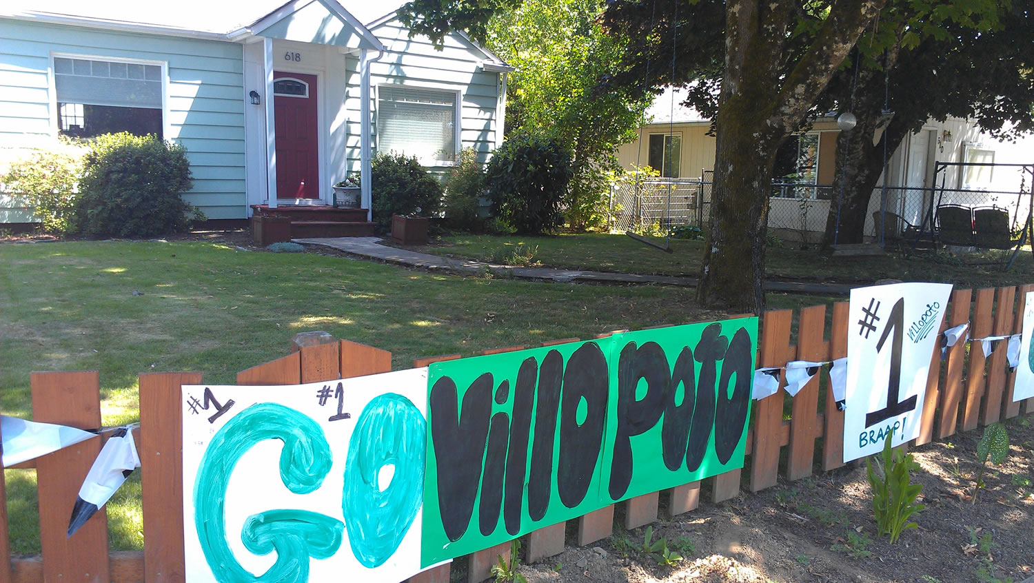 Kari Murphy and son Kyle Garman decorated their fence outside their home on the main street that leads to Washougal River Road and the Washougal MX Park.