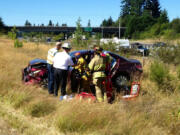 This Honda sedan left the roadway after it was struck by a Toyota minivan Thursday afternoon in Ridgefield.