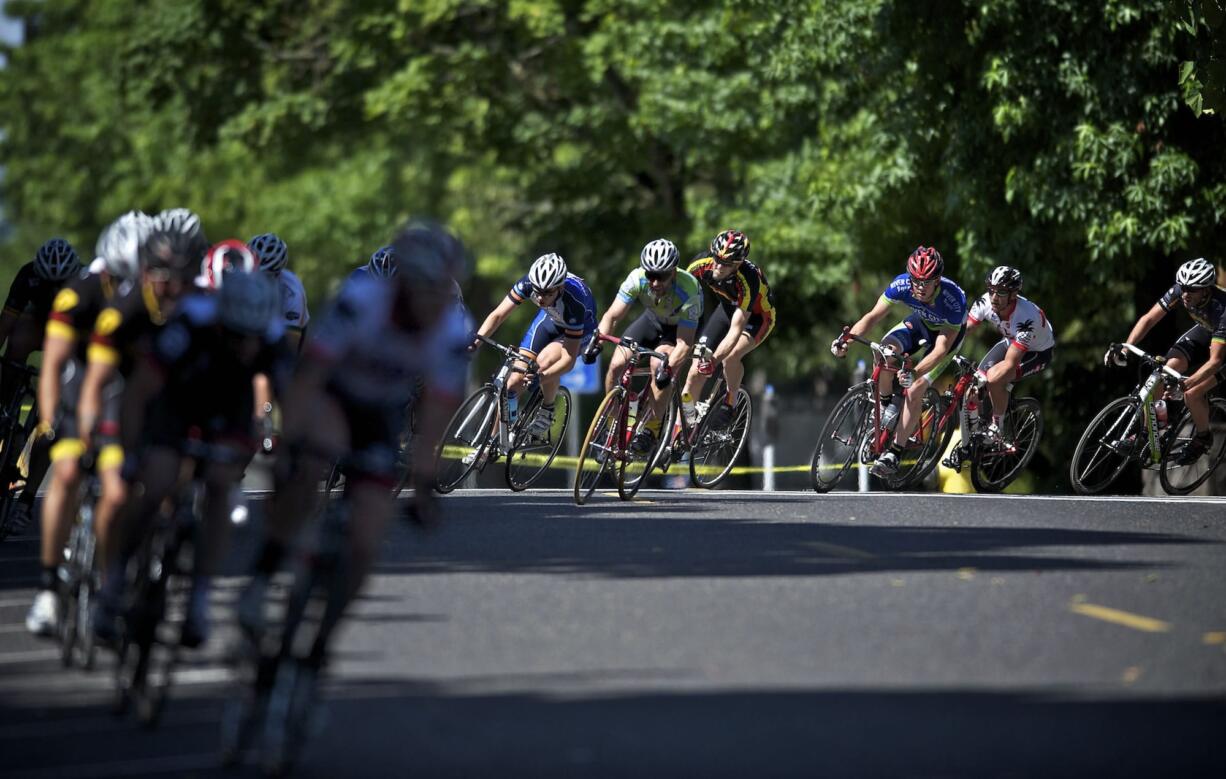 Racers in the Category 3 Men division turn south on Franklin Street during the 2012 Courthouse Crit.