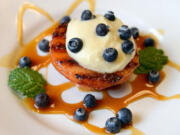 Grilled peaches with almond paste filling was prepared by chef Adrianna Oropeza at Sierra Nut House in Fresno, Calif.