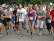 Columbia Way: Runners get started, in memory of Jordan Crouch.