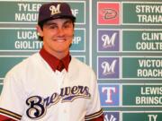 Clint Coulter stands tall after being selected by the Milwaukee Brewers with the 27th pick in the Major League Baseball 2012 Draft.