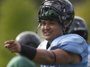 Skyview grad and Portland State quarterback Kieran McDonagh jokes with a teammate during practice last week.