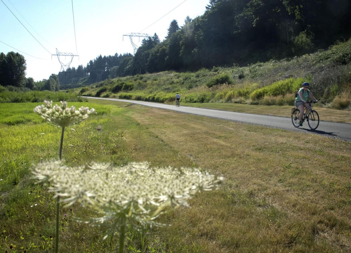 Fans call the eight-mile Burnt Bridge Creek Greenway trail &quot;a green jewel in the heart of the city.&quot; Highway construction broke the trail in two for nearly a year; now the entire trail is open for business again.