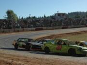 Photos by Mike Weber/For the Post-Record
Washougal's Brad Ruth (No. 10 black car on left) maneuvers around turn one of River City Speedway's quarter-mile clay oval track during the trophy dash race July 27, at the Columbia County Fairgrounds motorsports facility in St. Helens, Ore.