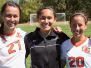 Olivia Lovell, Eryn Brown and Brittney Oljar (left to right) reconnected on the soccer field Friday, at Tualatin Hills Recreation Park in Beaverton, Ore.