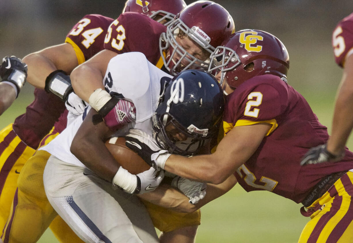 Skyview's Kalvin Johnson, #24,, carries the ball against Central Catholic at Hillsboro Stadium, Thursday, August 30, 2012.