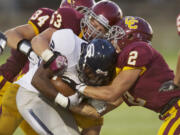 Skyview's Kalvin Johnson, #24,, carries the ball against Central Catholic at Hillsboro Stadium, Thursday, August 30, 2012.