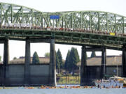 Hundreds of protesters cross the Columbia River in Vancouver on July 27, 2015, in support of an amphibious demonstration at the Interstate 5 Bridge against proposed fossil fuel facilities in the Northwest.