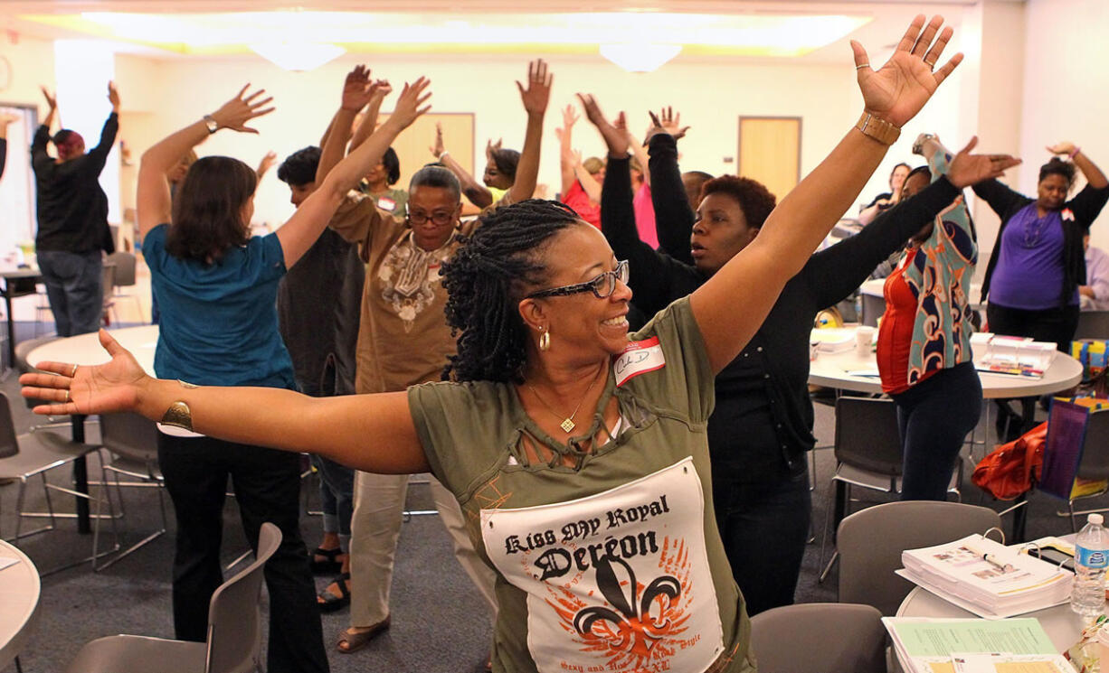 Carla DeBoe, foreground, with Urban League of Metropolitan St.