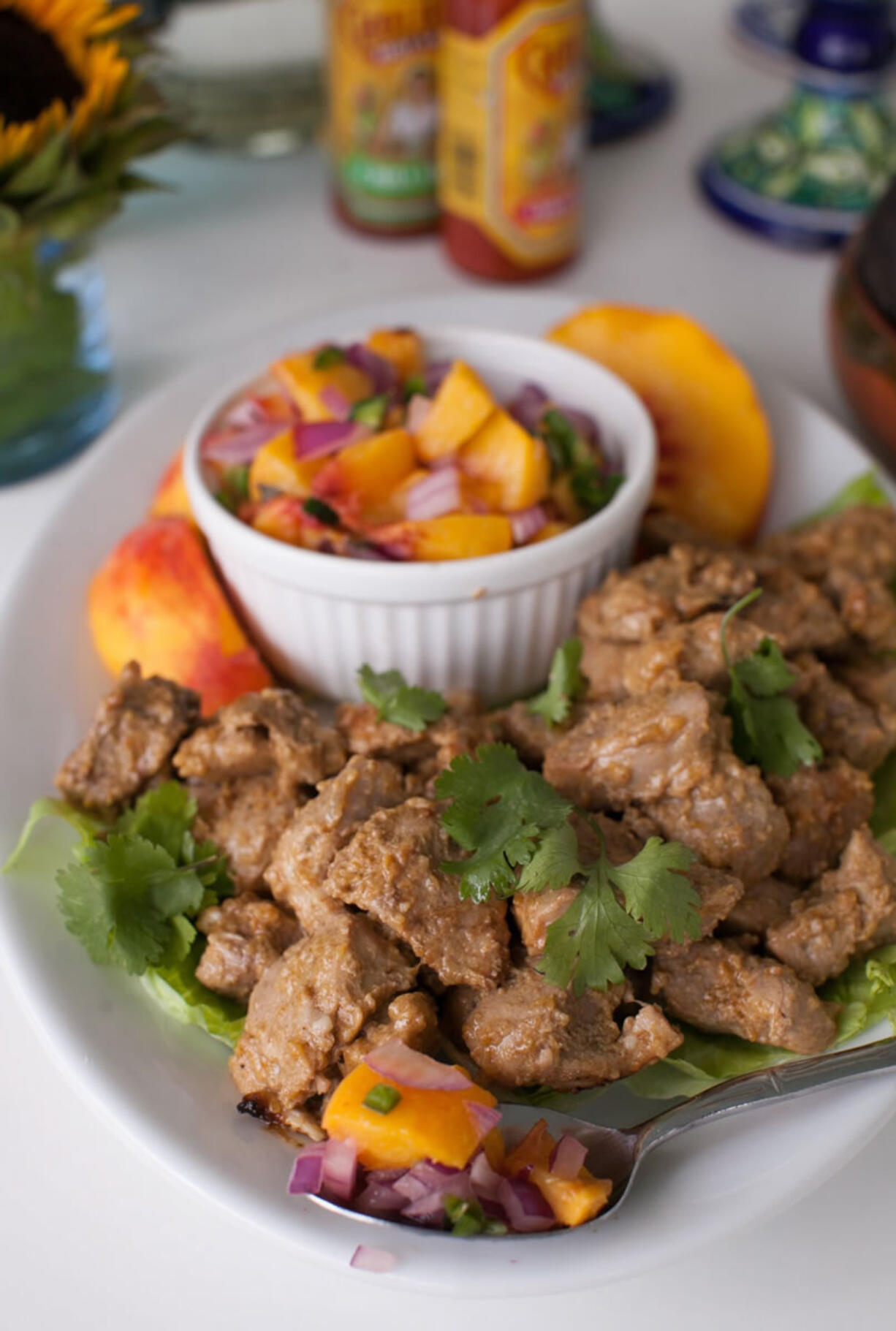 Renee Brock/Atlanta Journal-Constitution
Creating a taco bar at home is no longer the realm of ready-to-go kits with spice packets and jarred sauces. Making your own versions is the way to go with fillings such as this Pork al Pastor with Peach Salsa.