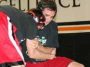 Tanner Baldwin (pictured during a summer practice) wrestled in New Zealand and Australia.