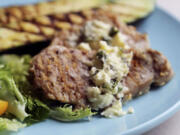 Pork Cutlets cook quickly and are accompanied by Zucchini and Oregano/Feta Butter.