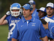 La Center head coach John Lambert coaches his 100th win against Stevenson.