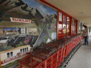 Carts are lined up at a Trader Joe's store in La Crescenta, Calif. The chain said it will end health benefits for part-time employees as of Jan.