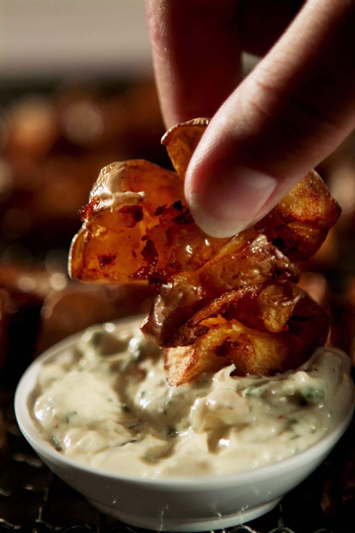 Photos by Anne Cusack/Los Angeles Times
When smashed fried potatoes call your name, pair with creamy ranch dipping sauce.