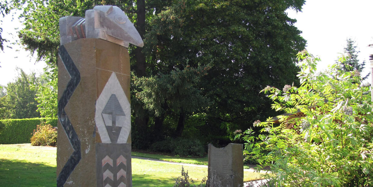 A basalt column carved by Greg Robinson, a tribal council member of the Chinook Indian Nation, is located in the Chinook Plaza, in Washougal.