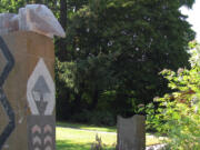 A basalt column carved by Greg Robinson, a tribal council member of the Chinook Indian Nation, is located in the Chinook Plaza, in Washougal.