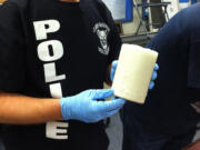 During a Thursday drug raid, police seized a thermos filled with liquid methamphetamine.