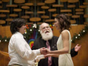 Rob Figley officiates at the marriage of Jessica Lee, 19, left, and Ashley Cavner, 21, both of Vancouver on Dec. 7, 2012, at the First Congregational Church in Vancouver. It is believed to be the first same-sex marriage legally recognized by Clark County.