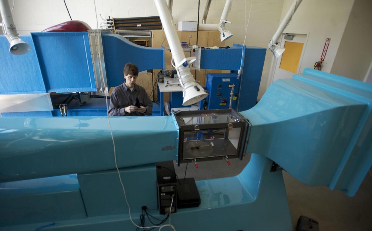 Steve Solovitz, professor of mechanical engineering, explains how two new wind tunnels are used inside a renewable energy/technology lab at Washington State University Vancouver.