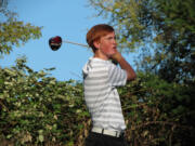 Brian Humphreys watches his golf ball land on the sixth green Thursday, at Camas Meadows.