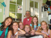 Girl Scouts Becky Hodges, Ashley Voeltz, Emily Van Orden, Savanna Slocum, Shannon McDaniel and Emma Spaeth (left to right) deliver two new ceiling fans to the West Columbia Gorge Humane Society's cat building.