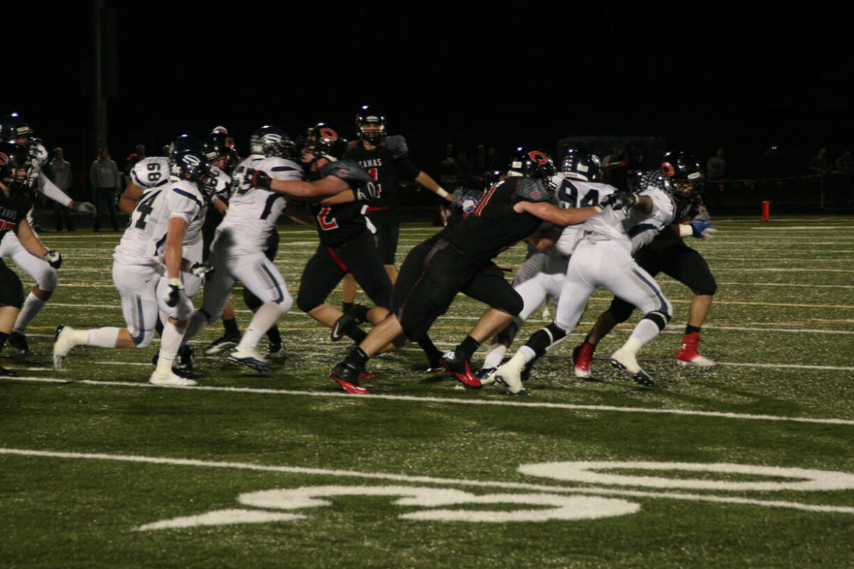 The Camas offensive line pushes Skyview in both directions Friday, at Doc Harris Stadium.