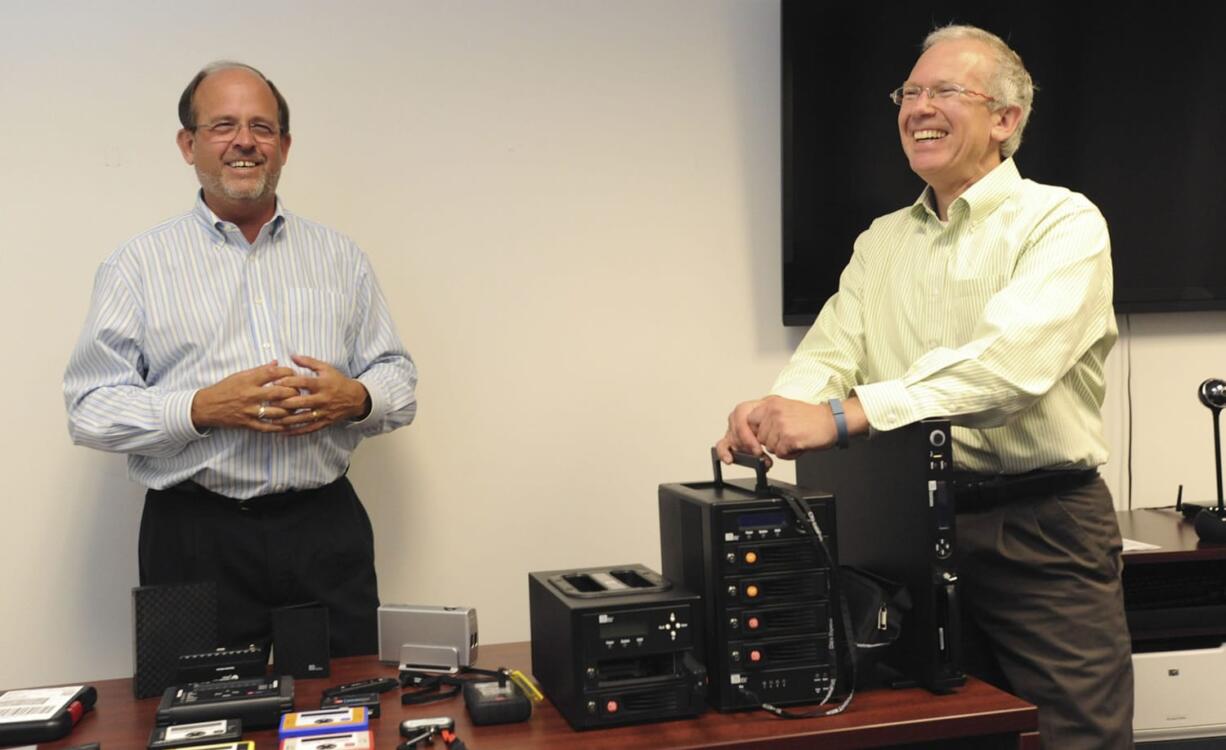 Randy Barber, left, president of CRU Inc.