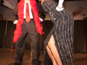 Robert Holcomb 
 The moves, the partner and the feather boa all helped Ed Barnes rock the Dancing With the Local Stars competition, a fundraiser for the Fort Vancouver National Trust, Sept. 15 at Pearson Air Museum in Vancouver.