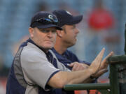 Seattle Mariners manager Eric Wedge looks on prior to their baseball game against the Los Angeles Angels, Tuesday, Sept. 25, 2012, in Anaheim, Calif.  (AP Photo/Mark J.