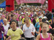 Participants take off from the starting line of the 2012 Girlfriends Half Marathon in downtown Vancouver. In the past six years, the event has raised more than $260,000 for Susan G.