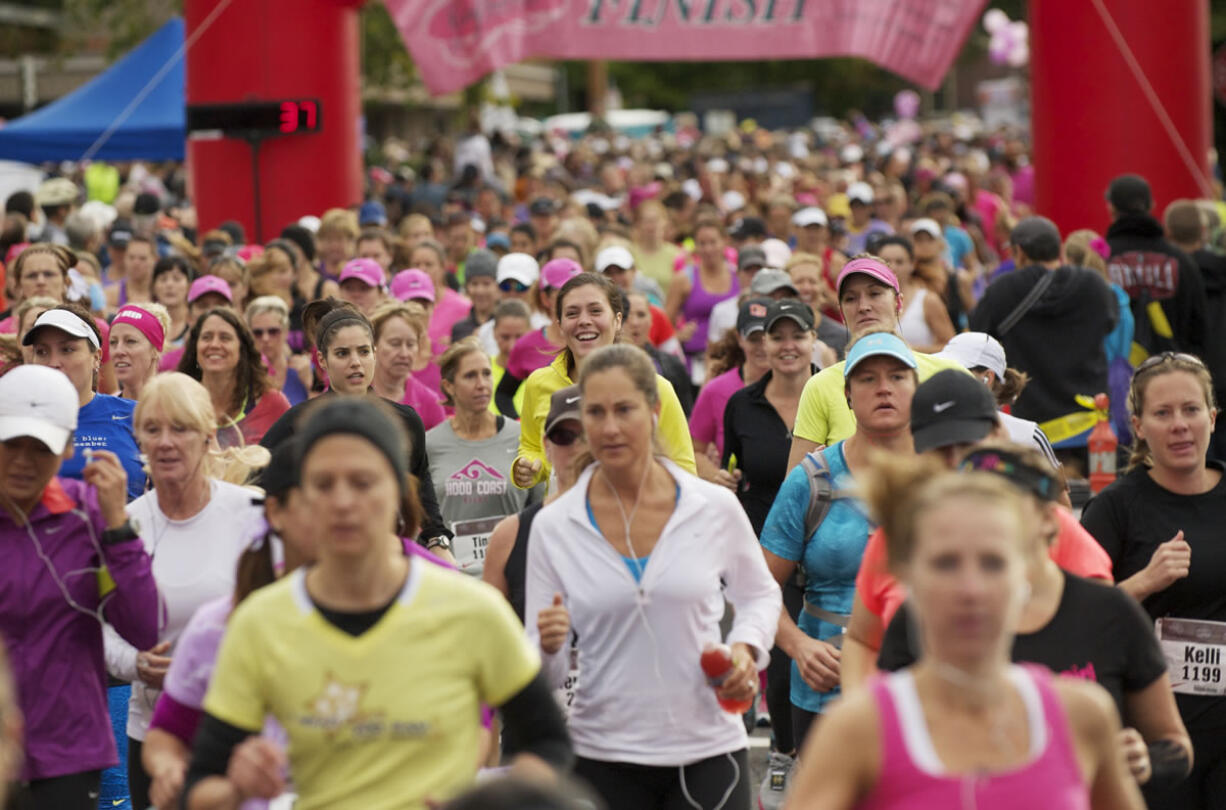 Participants leave the starting line of the 2012 Girlfriends Half Marathon.