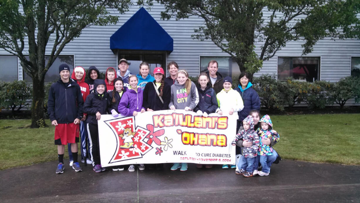 Camas teens Ka'iulani Warren (center, red hat) and friend Luke Bruno (far left, black hat) organized a team for the recent Step Out: Walk to Stop Diabetes on Sept. 28.