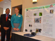 CHS sophomore Sophie Shoemaker poses for a photo with Subhash Singhald, president elect of the Washington State Academy of Sciences group.