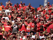 Kansas City Chiefs fans cheer during the second half of an NFL football game against the New York Giants  at Arrowhead Stadium in Kansas City, Mo., Sunday, Sept. 29, 2013.