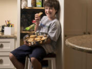 Eli Waldman of Arlington, Va., who has been diagnosed with celiac disease, has his own space in the pantry for gluten-free foods.