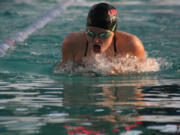 Corrine Bintz cuts through the water as the sun shines on her back Wednesday, at the Grass Valley Aquatics Center.