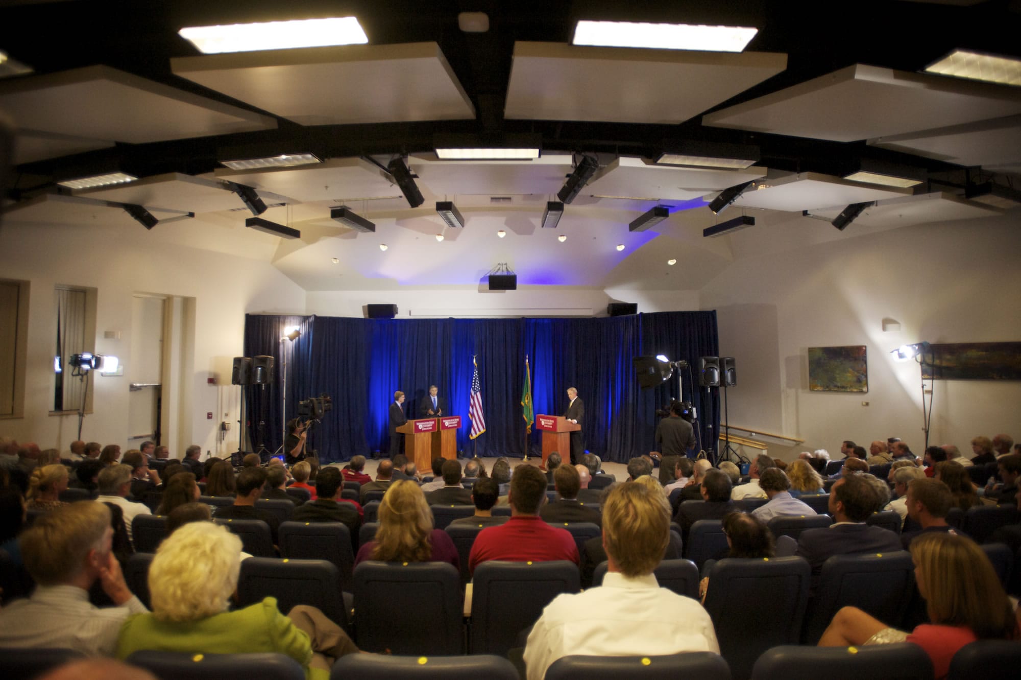 A debate between Washington gubernatorial candidates Rob McKenna, left, and Jay Inslee drew a crowd of 200 to the Washington State University Vancouver campus Wednesday.