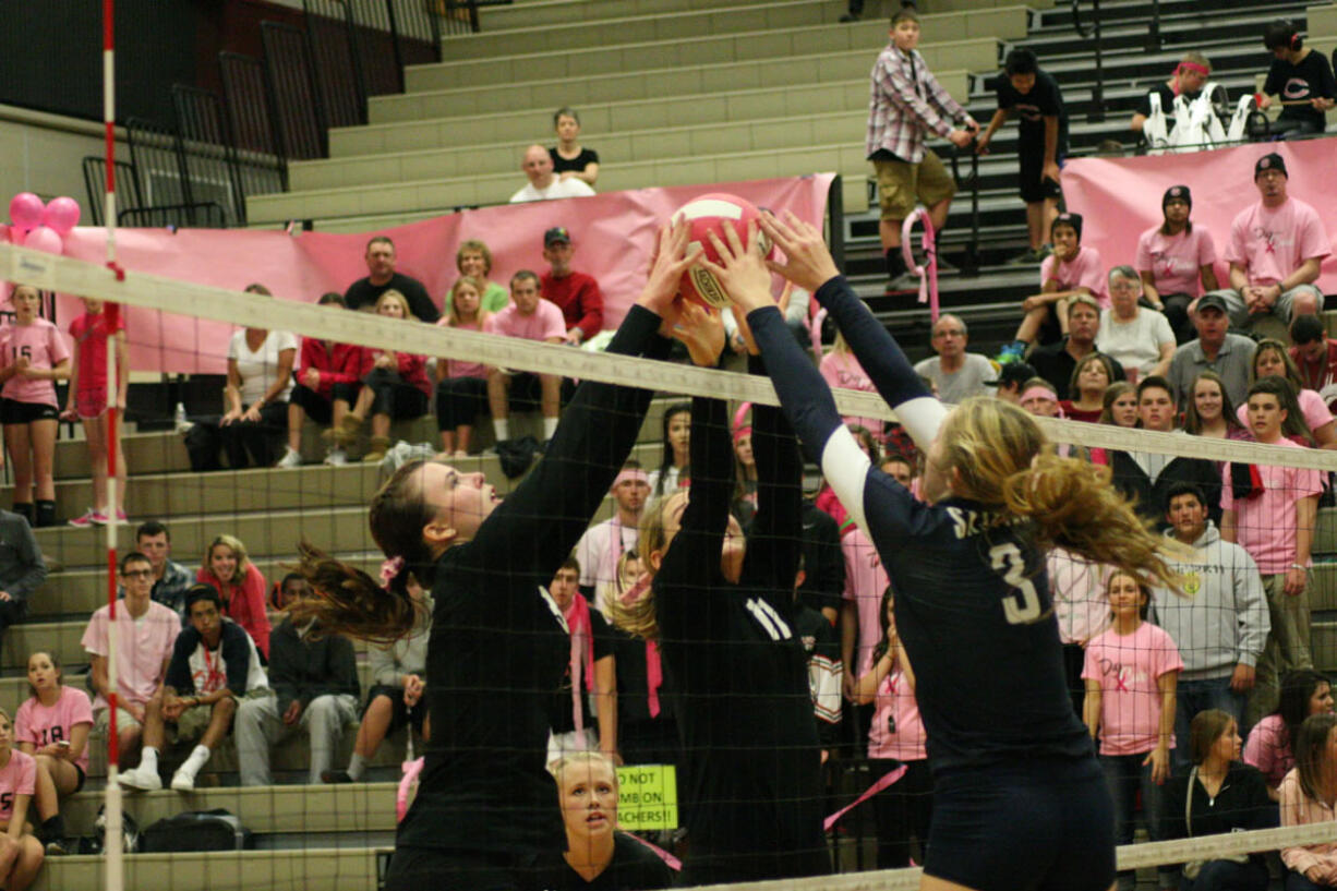 Cassie Bailie watches her Camas teammates Christina Elliott and Carly Banks double team a Skyview player Thursday.