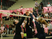 Cassie Bailie watches her Camas teammates Christina Elliott and Carly Banks double team a Skyview player Thursday.