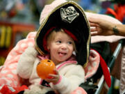 Arya Kubesh, 19 months, dons a pirate hat for Halloween at Creative Kidstuff at Galleria Mall in Edina, Minn., on Oct.