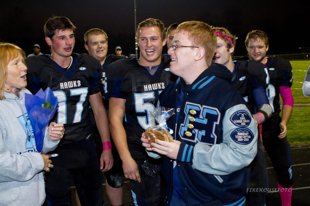 Hockinson senior Colton Viola after being presented a letterman's jacket on Friday, Oct.