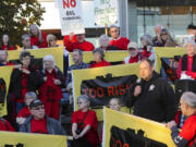 Cager Clabaugh, president of the International Longshore and Warehouse Union Local 4, speaks Tuesday during a rally against a proposed oil terminal in Vancouver.