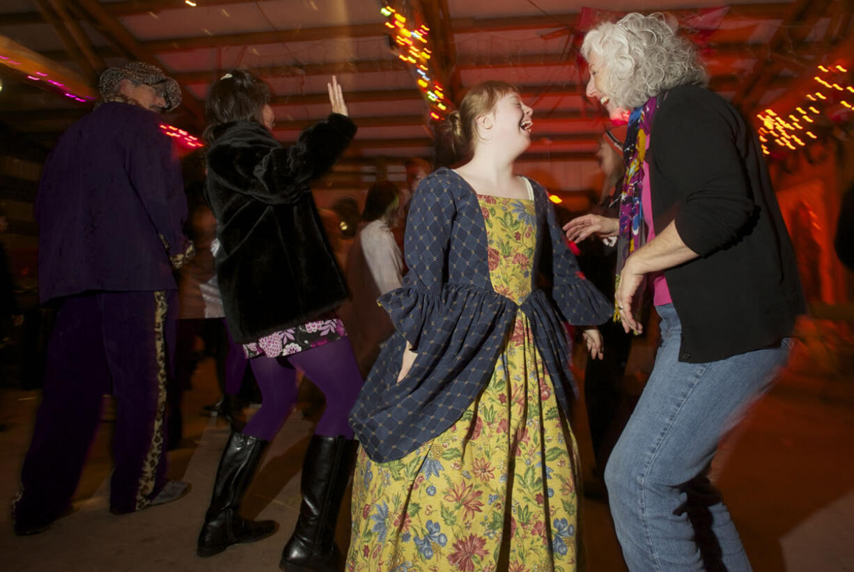 Faith Moore, 12, and her mom Mary Jane Moore attend a Halloween party at the home of Mary Siebert.