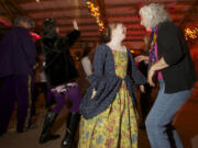 Faith Moore, 12, and her mom Mary Jane Moore attend a Halloween party at the home of Mary Siebert.