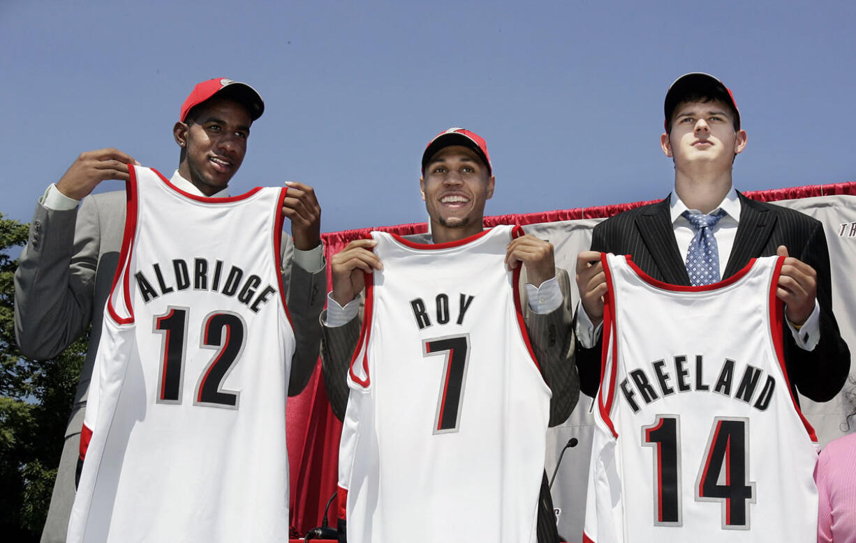 Associated Press files
Joel Freeland, right, joined LaMarcus Aldridge and Brandon Roy as members of the Blazers' 2006 draft class, but he hasn't played for the team until this season.