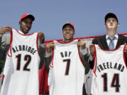 Associated Press files
Joel Freeland, right, joined LaMarcus Aldridge and Brandon Roy as members of the Blazers' 2006 draft class, but he hasn't played for the team until this season.